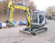 Neuson Wacker Neuson 6003 mit Verstellausleger