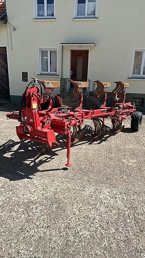 Vogel & Noot XM950 Vario Plus, 4Schar, BJ 2015, Steinsicherung, hydr. Packerarm, Verschleißteile sehr gut